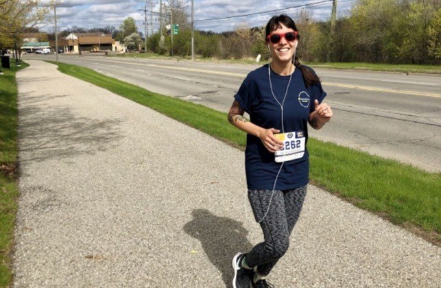claire running by road