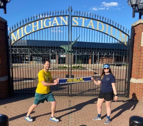 2 people at michigan stadium