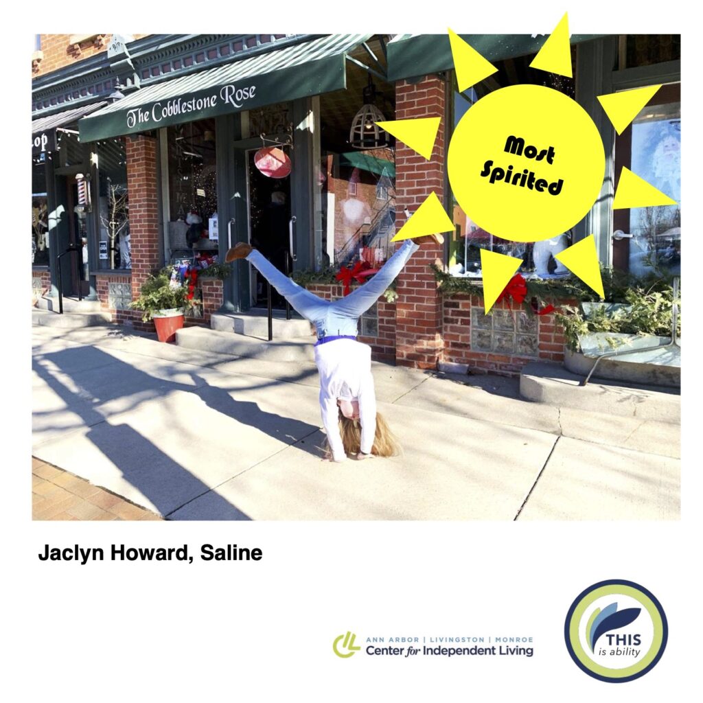 Jacklyn Howard, saline, doing a cartwheel downtown saline with most spirited graphic overlay