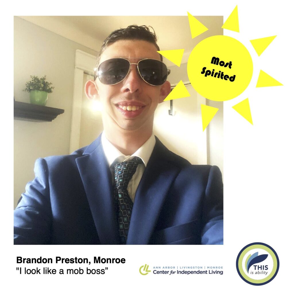 Brandon Preston, Monroe, wearing a suit and taking a selfie, saying I look like a mob boss. Most spirited graphic.